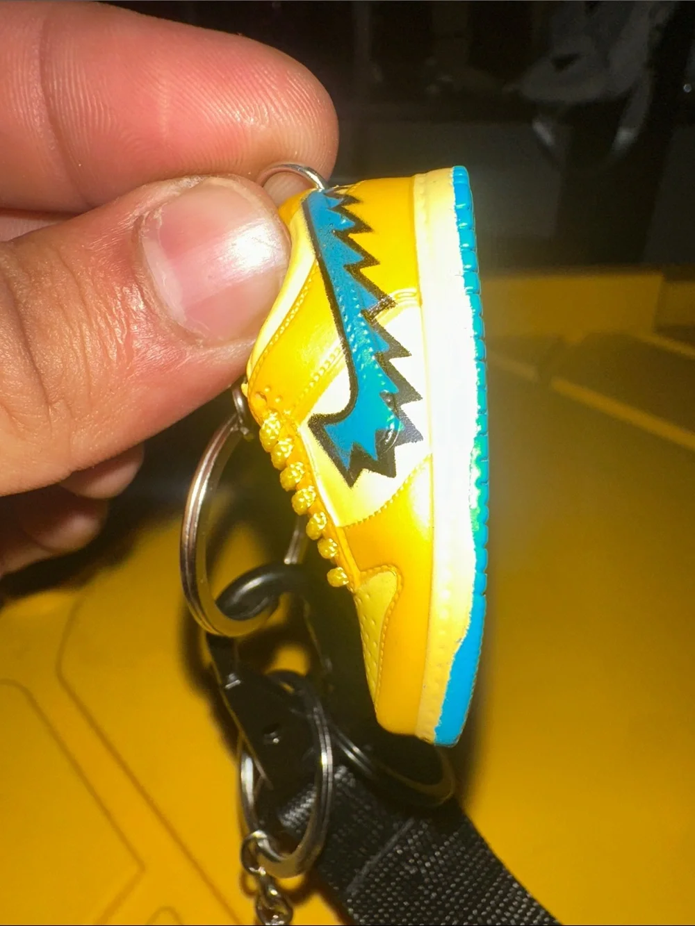 Jordan Kids Black Lanyard with Yellow jordSneaker Charm and Red Spider man Badge